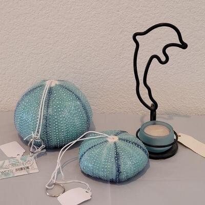 Lot 117: (2) New Sea Urchin Air Plant Holders and Maui Dolphin Candle holder 
