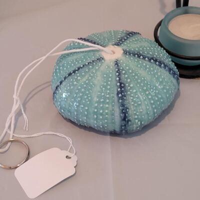 Lot 117: (2) New Sea Urchin Air Plant Holders and Maui Dolphin Candle holder 