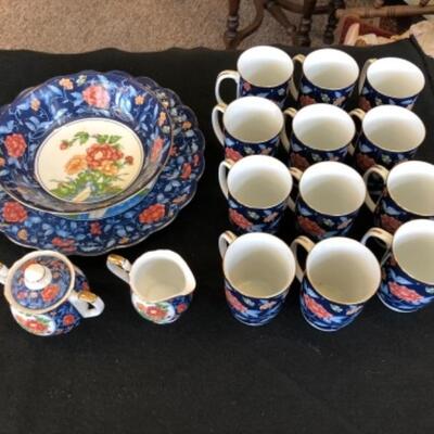 Lot 9P.  Gump’s tea set: 12 cups, cream & sugar, medium bowl —$77.50