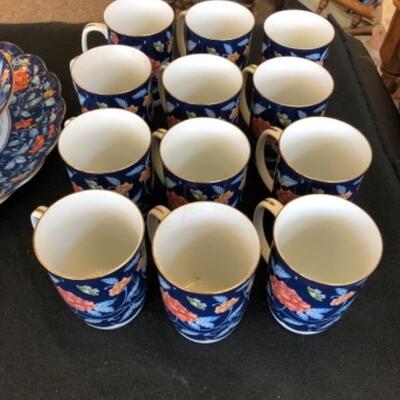 Lot 9P.  Gump’s tea set: 12 cups, cream & sugar, medium bowl —$77.50