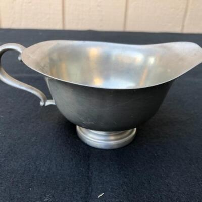 Lot 29P 1 Pewter gravy boat, Preisner Pewter 2158; Pewter candle stick holder with glass hurricane â€” $12.50