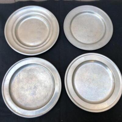 Lot 35P. 9 Pewter plates/chargers: 6 Woodbury Pewter, made in England; 3 unbranded â€” $25