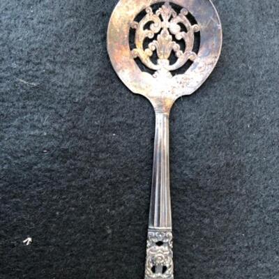 Lot 44P. Silver plate small slotted spoon , Community Plate â€” $2.50