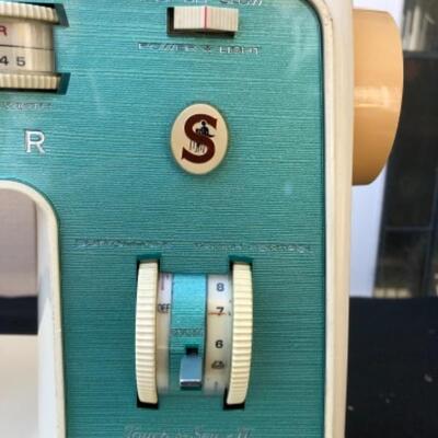 Lot 51L. Vintage Singer Sewing Machine Touch and Sew II Model 775,  in case with box of attachments and bag of sewing notions, and works...