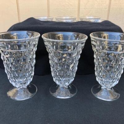 Lot 54L. Fostoria American Stemware, 12 Water/Ice Tea Glasses, round bases â€” $30