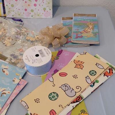 Lot 137: New Gift Bags, Wrapping Paper, Ribbon, Bow and Invitations 