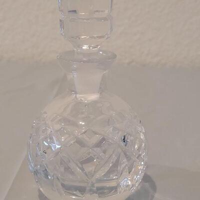 Lot 141: (2) Waterford Perfume Bottles (one has a chipped stopper)