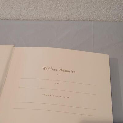 Lot 166: Wedding Photo Frame and Album (Album has a bend in the cover)