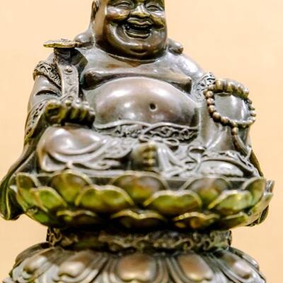 Bronze laughing Buddha on cherry wood stand