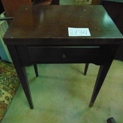 Item 134 Sewing machine and cabinet