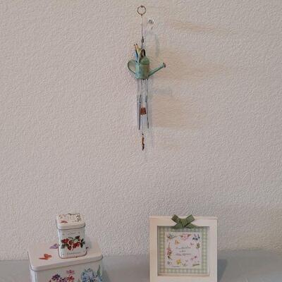 Lot 189: New Tin, Candle Mini Wind Chime and Marjolein Bastin Framed Deco