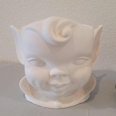 Lot 208:  (2) Fairy Head Planters (no drain holes)