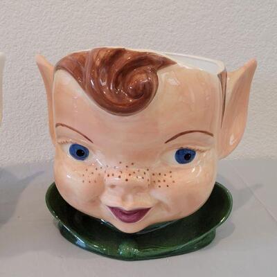 Lot 208:  (2) Fairy Head Planters (no drain holes)