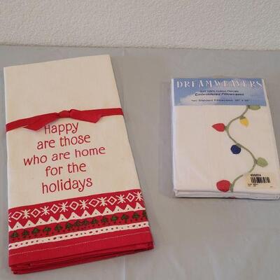 Lot 213: New Dreamweaver Pillowcases and Christmas Handtowels