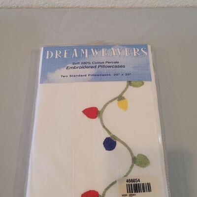 Lot 213: New Dreamweaver Pillowcases and Christmas Handtowels