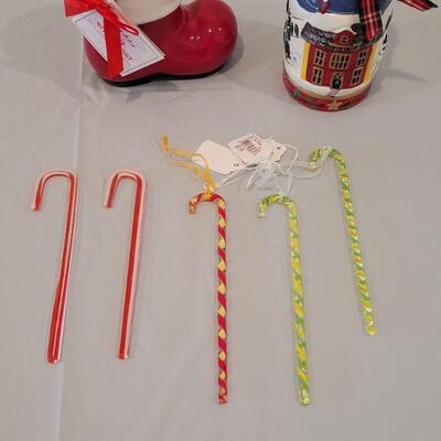Lot 217: New  Santa Giving Boot, Jar Candle Holder and Glass Candy Canes