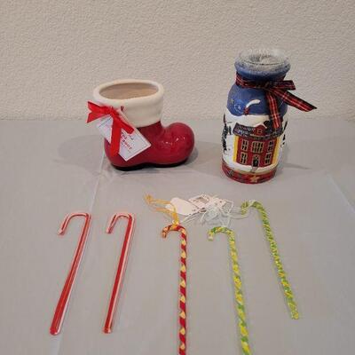 Lot 217: New  Santa Giving Boot, Jar Candle Holder and Glass Candy Canes