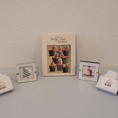 Lot 237: Anne Geddes 12 Days of Christmas Book and (2) Mini Decorative Framed Art