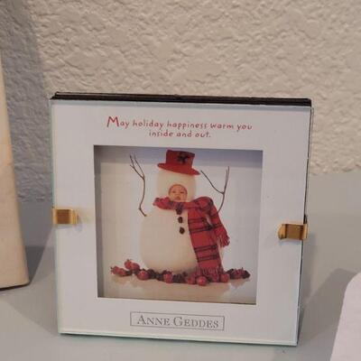 Lot 237: Anne Geddes 12 Days of Christmas Book and (2) Mini Decorative Framed Art