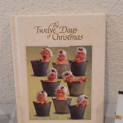 Lot 237: Anne Geddes 12 Days of Christmas Book and (2) Mini Decorative Framed Art
