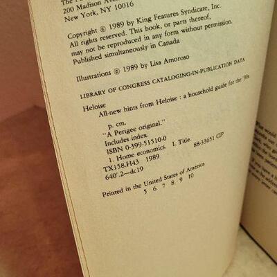 Lot 269: Vintage Books - Girl Scout Handbook and LADY HELOISE Hints