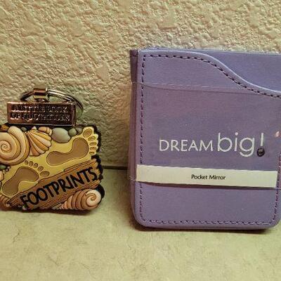 Lot 285: Assortment of New Pocket Mirrors and FOOTPRINTS Mini Book Keychain