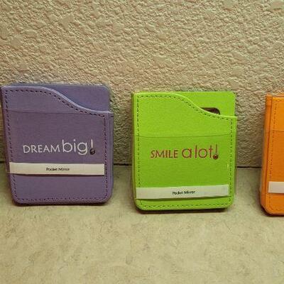 Lot 285: Assortment of New Pocket Mirrors and FOOTPRINTS Mini Book Keychain