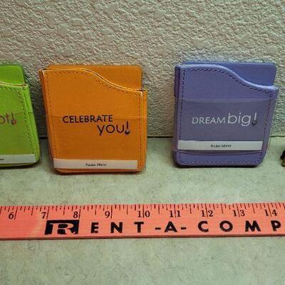 Lot 287: Assorted Pocket Mirrors + Mini Book Keychain 