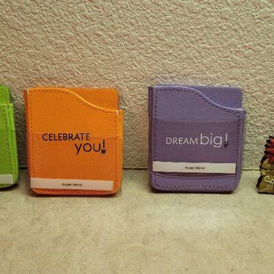 Lot 287: Assorted Pocket Mirrors + Mini Book Keychain 