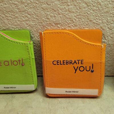 Lot 287: Assorted Pocket Mirrors + Mini Book Keychain 