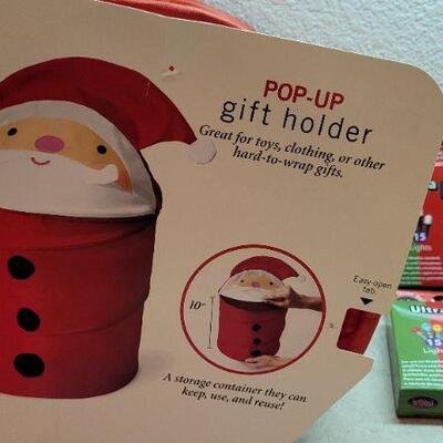 Lot 290: New ULTRA LED Light Packs (4) an Pop Up Christmas Gift Holder