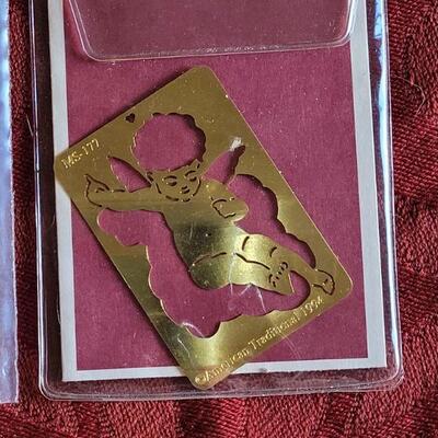 Lot 371: (4) Metal Holiday Embossing Stencils 