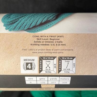 six skeins of acrylic yarn