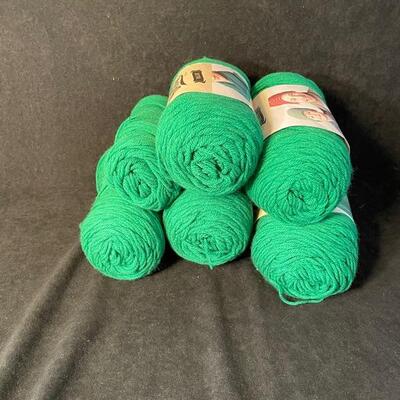 six skeins of acrylic yarn