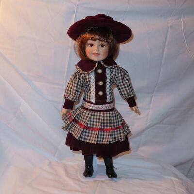 Porcelain Doll with short red hair 