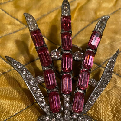 Broach with bow design