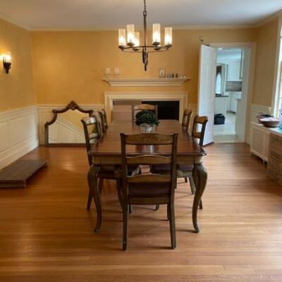 Like new Hooker dining table with six chairs. 