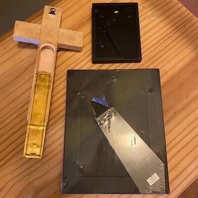 2 frames and a "Sick Call" crucifix