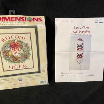 Two Christmas needlework kits