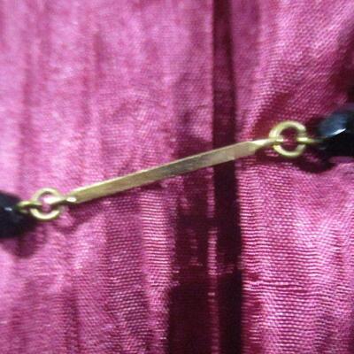 Lot 6 - Gold Tone Bar with Black Beads Necklace