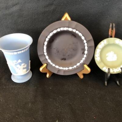 Lot 25P. Wedgwood Jasperware porcelain: 1 blue vase, 1 celadon ashtray, 1 black ashtray — $12