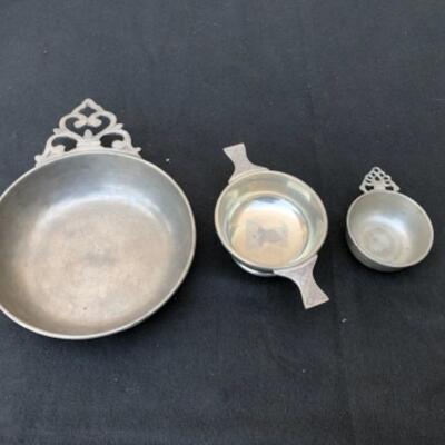 Lot 30P. 3 Pewter bowls with handles : 1 large porridge bowl , Jori; 1 Woodbury Pewter, Made in England; 1 Norman Holmes Tenterden, Rye &...