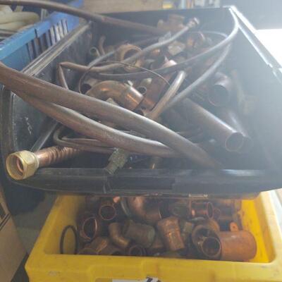 LOT 74 - Copper and brass fittings - over 150 pieces - in bins
