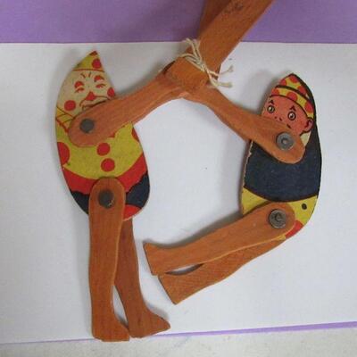 Antique Wood Riveted Jumping Toy 