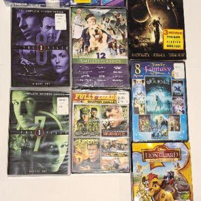 10 Assorted DVDs (Sealed)- Item #353
