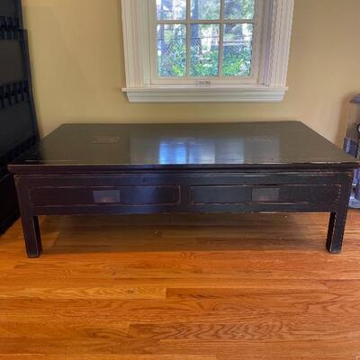 Black coffee table with four drawers 