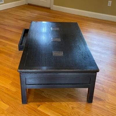 Black coffee table with four drawers 