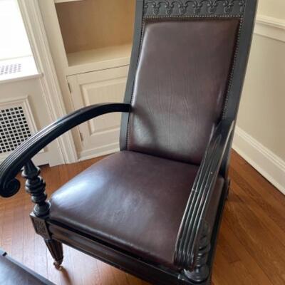Gorgeous unique leather chair with matching ottoman