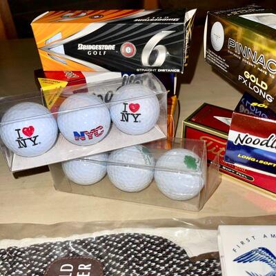 Lot 211  Group of Packaged & Souvenir Golf Balls Glove Tees