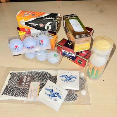Lot 211  Group of Packaged & Souvenir Golf Balls Glove Tees